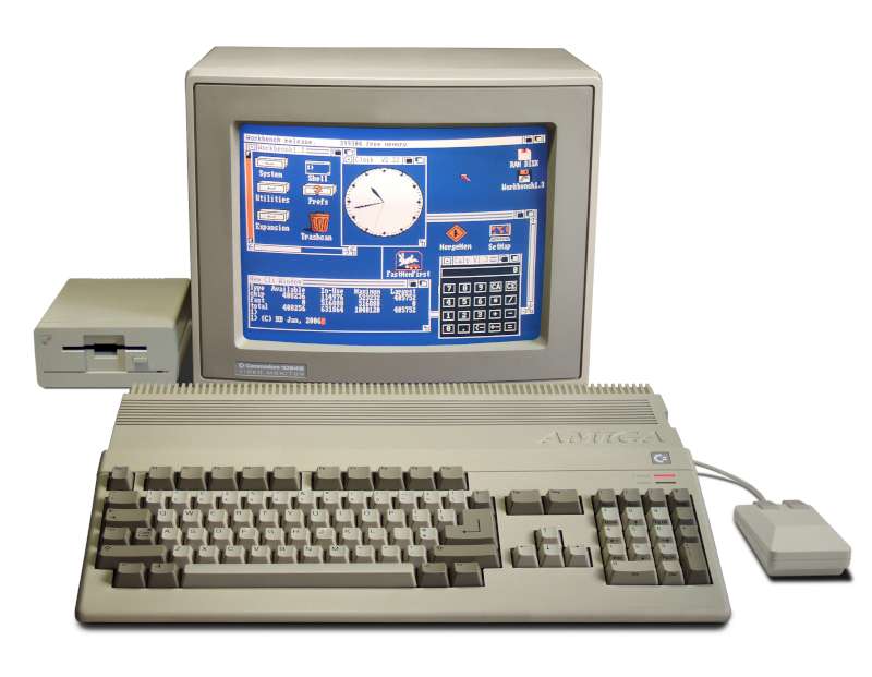 Amiga 500 classic computer system with monitor, keyboard, mouse, and floppy drive